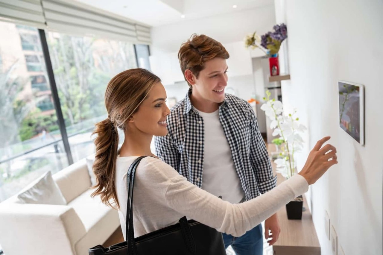 couple managing home heating system